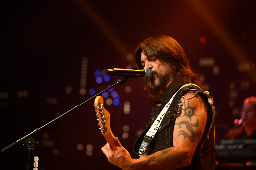Juanes performing on tour